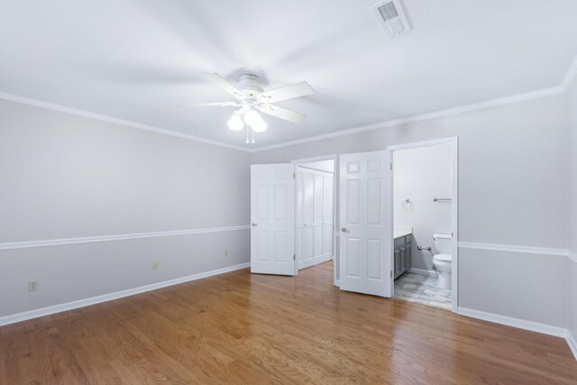 6756 Hickory Manor Cir, Chattanooga, TN 37421 - unfurnished bedroom with light wood-type flooring, ensuite bath, ornamental molding, a ceiling fan, and a closet