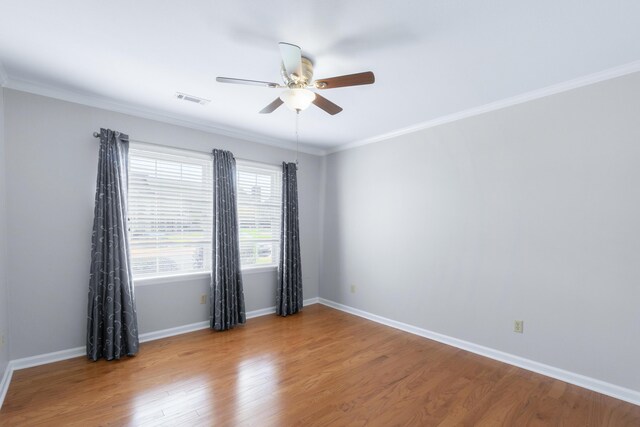 6756 Hickory Manor Cir, Chattanooga, TN 37421 - unfurnished room with ceiling fan, wood finished floors, and crown molding