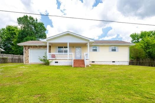 2618 Alvin York Hwy, Whitwell, TN 37397 - view of front of property featuring crawl space, covered porch, and an attached garage