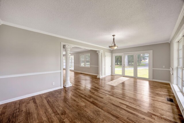 15 Moon Beam Cir, Rock Spring, GA 30739 - unfurnished room featuring decorative columns, a textured ceiling, wood finished floors, and crown molding