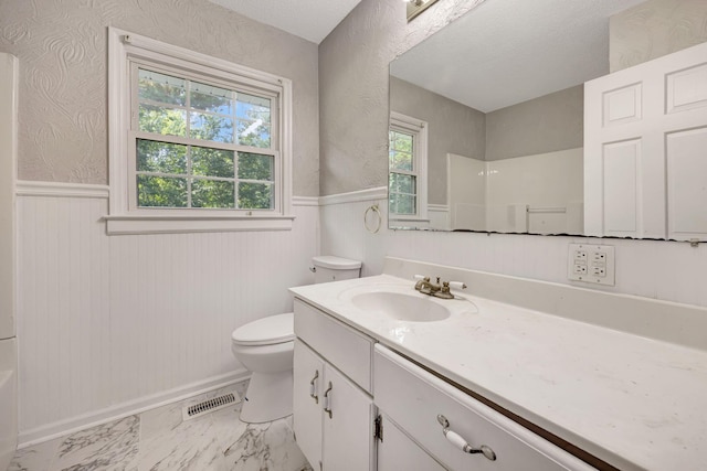 15 Moon Beam Cir, Rock Spring, GA 30739 - bathroom with vanity, a wainscoted wall, marble finish flooring, and a shower