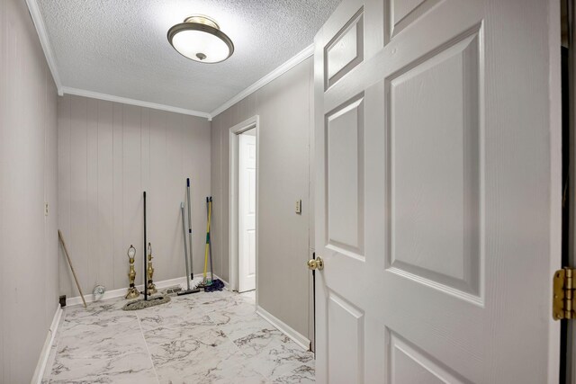 15 Moon Beam Cir, Rock Spring, GA 30739 - entryway featuring marble look tile flooring, ornamental molding, and a textured ceiling