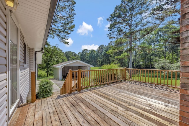 15 Moon Beam Cir, Rock Spring, GA 30739 - wooden deck featuring an outdoor structure and view of scattered trees