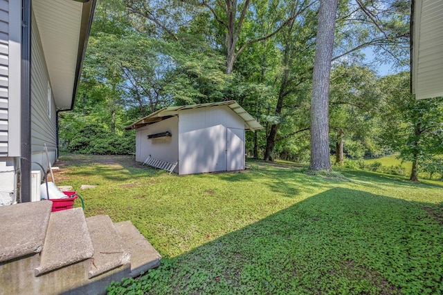 15 Moon Beam Cir, Rock Spring, GA 30739 - view of green lawn with a storage shed and view of scattered trees