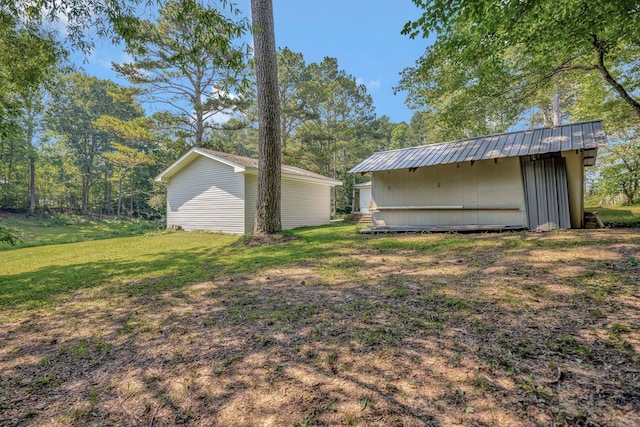 15 Moon Beam Cir, Rock Spring, GA 30739 - view of grassy yard with an outbuilding