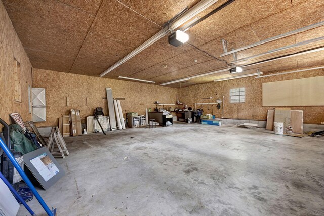 15 Moon Beam Cir, Rock Spring, GA 30739 - garage featuring a garage door opener and a workshop area
