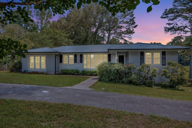 15 Moon Beam Cir, Rock Spring, GA 30739 - single story home featuring a front yard and a metal roof