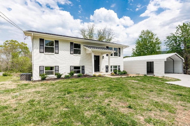 318 Yates Springs Rd, Ringgold, GA 30736 - view of front of house with a front lawn, a carport, brick siding, and concrete driveway
