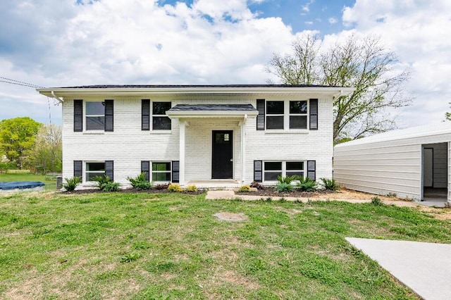318 Yates Springs Rd, Ringgold, GA 30736 - bi-level home with a front yard and brick siding