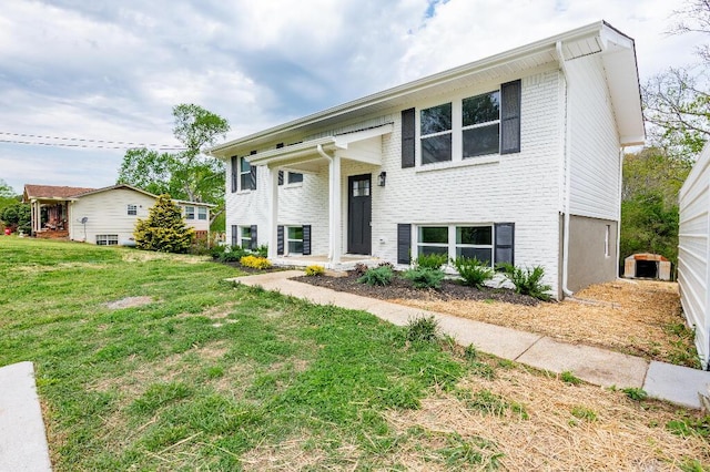 318 Yates Springs Rd, Ringgold, GA 30736 - raised ranch with a front lawn and brick siding