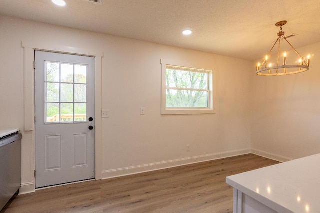 318 Yates Springs Rd, Ringgold, GA 30736 - unfurnished dining area with a chandelier, light wood-style flooring, and recessed lighting