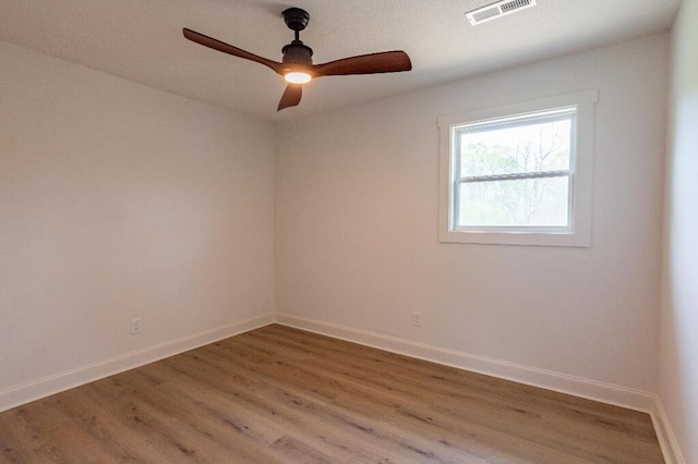 318 Yates Springs Rd, Ringgold, GA 30736 - spare room featuring light wood finished floors and ceiling fan