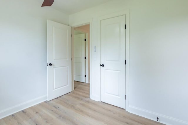 318 Yates Springs Rd, Ringgold, GA 30736 - unfurnished bedroom with light wood finished floors and baseboards