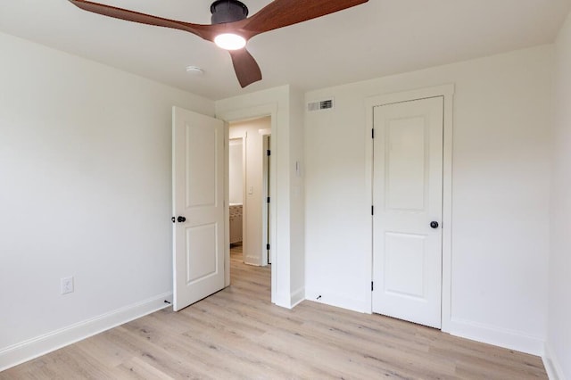 318 Yates Springs Rd, Ringgold, GA 30736 - unfurnished bedroom featuring light wood-style flooring and a ceiling fan