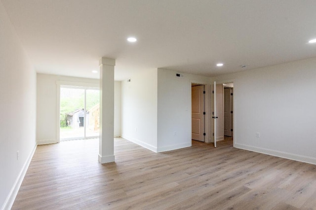318 Yates Springs Rd, Ringgold, GA 30736 - empty room with light wood-style floors, recessed lighting, and ornate columns
