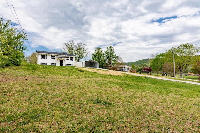 318 Yates Springs Rd, Ringgold, GA 30736 - view of green lawn with a carport