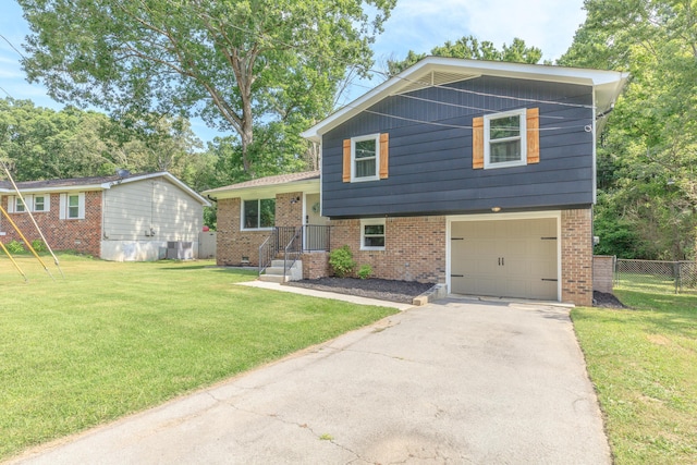 88 Sparrow Ln, Ringgold, GA 30736 - split level home with a garage, brick siding, and asphalt driveway