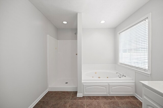 75 Sequoyah Trl, Ringgold, GA 30736 - full bath with a tub with jets, vanity, a shower, tile patterned flooring, and recessed lighting