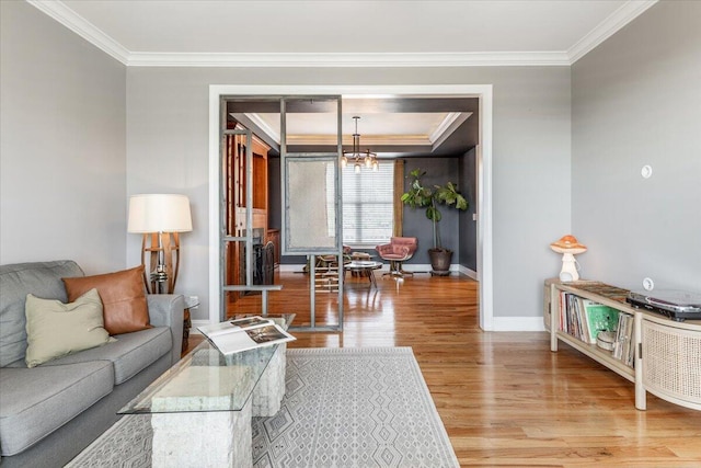 7918 Chianti Way, Chattanooga, TN 37421 - living room with wood finished floors, ornamental molding, a chandelier, and a raised ceiling