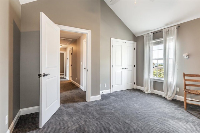 7918 Chianti Way, Chattanooga, TN 37421 - unfurnished bedroom featuring dark carpet, lofted ceiling, and a closet