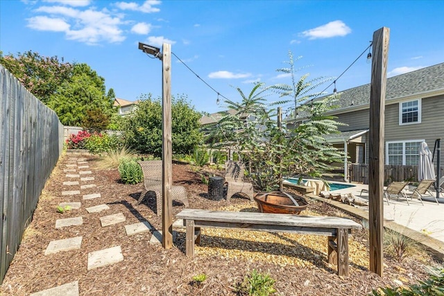 7918 Chianti Way, Chattanooga, TN 37421 - fenced backyard featuring a patio area and a fire pit