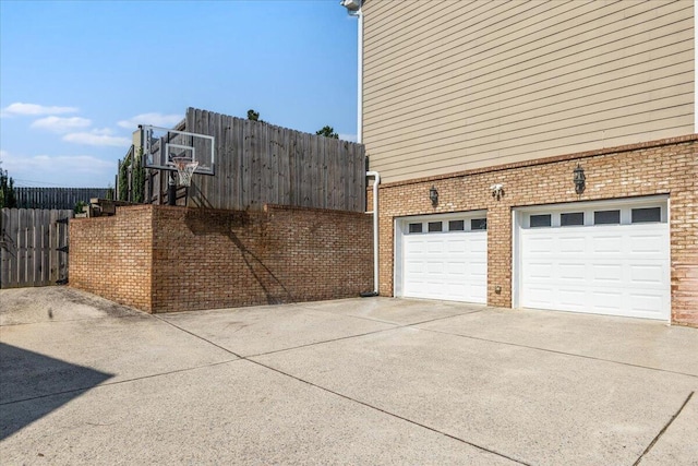 7918 Chianti Way, Chattanooga, TN 37421 - garage with driveway and basketball court