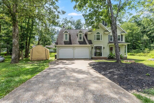 2416 Mourning Dove Ln, Signal Mountain, TN 37377 - view of front of property with driveway, a chimney, and a front yard