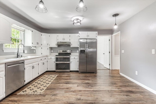 2416 Mourning Dove Ln, Signal Mountain, TN 37377 - kitchen with stainless steel appliances, under cabinet range hood, and white cabinets