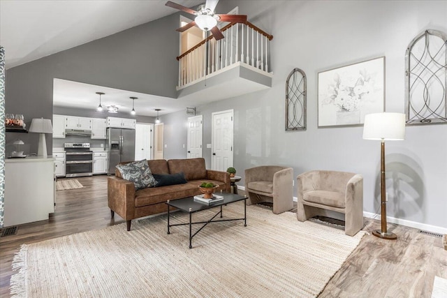 2416 Mourning Dove Ln, Signal Mountain, TN 37377 - living area featuring high vaulted ceiling, dark wood finished floors, and a ceiling fan