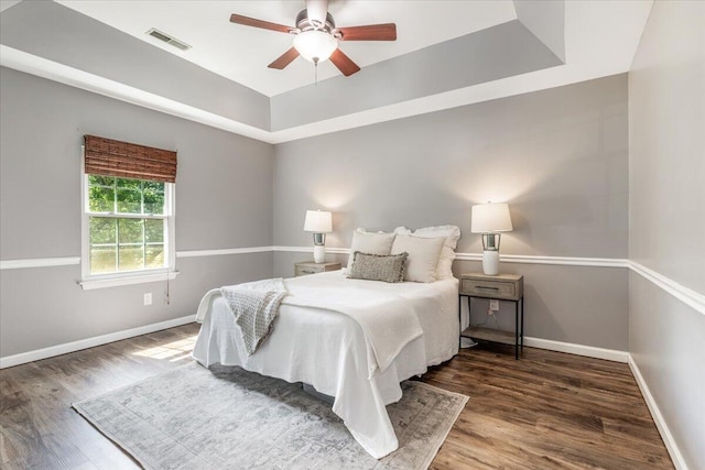2416 Mourning Dove Ln, Signal Mountain, TN 37377 - bedroom with a tray ceiling, wood finished floors, and a ceiling fan