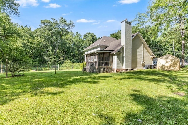 2416 Mourning Dove Ln, Signal Mountain, TN 37377 - back of house featuring a sunroom, a chimney, and a storage unit