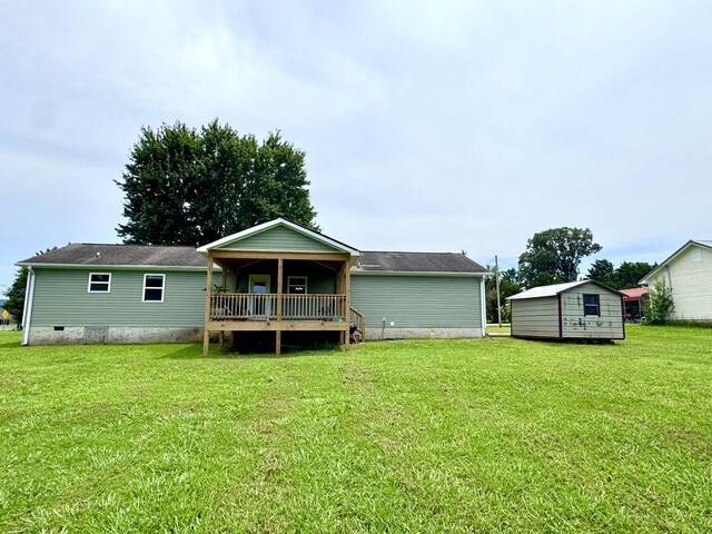 1828 Saunders Rd, Ringgold, GA 30736 - rear view of property with a yard, crawl space, and an outdoor structure