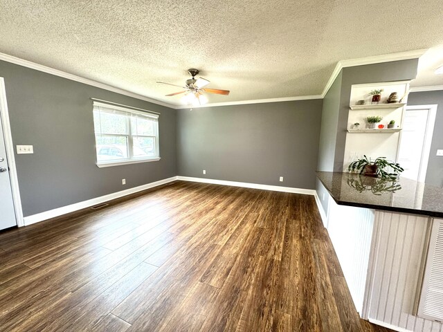 1828 Saunders Rd, Ringgold, GA 30736 - empty room featuring ornamental molding, ceiling fan, dark wood finished floors, and a textured ceiling