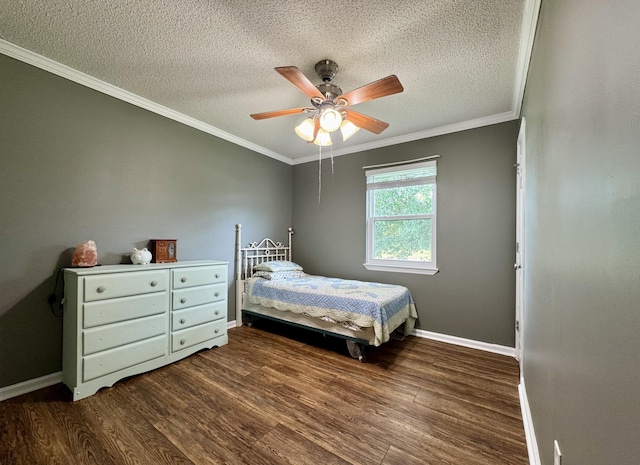 1828 Saunders Rd, Ringgold, GA 30736 - bedroom with dark wood-style floors, a textured ceiling, ornamental molding, and a ceiling fan