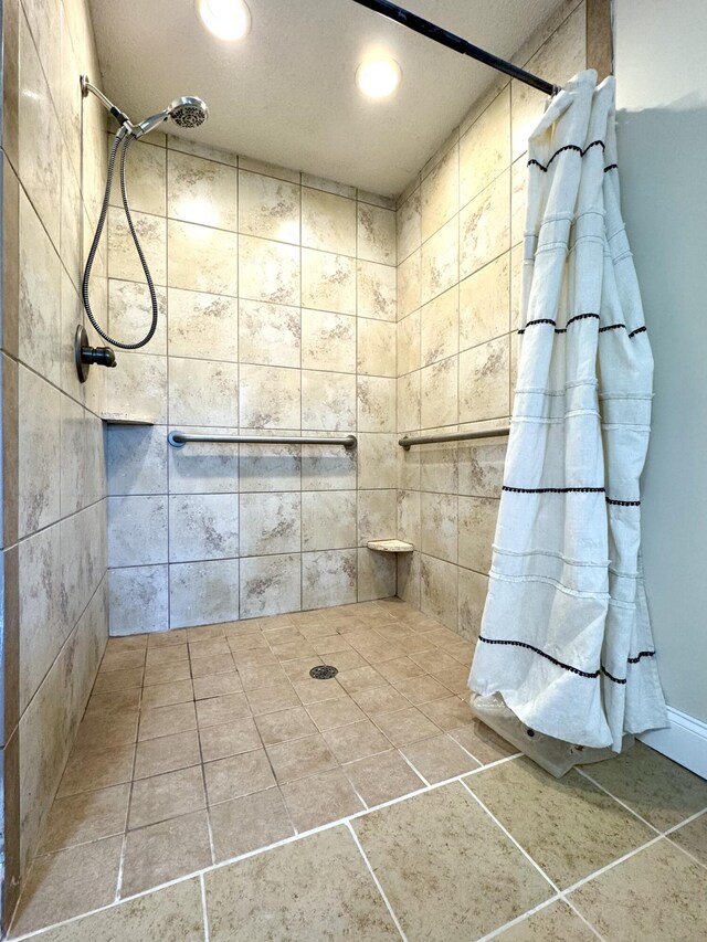 1828 Saunders Rd, Ringgold, GA 30736 - full bath with tiled shower, recessed lighting, and tile patterned flooring