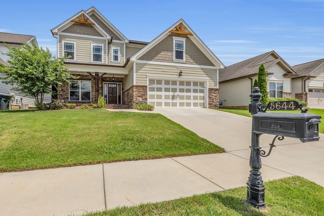 5644 Bungalow Cir, Hixson, TN 37343 - craftsman house featuring an attached garage, stone siding, a front lawn, and concrete driveway