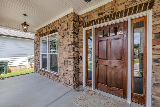 5644 Bungalow Cir, Hixson, TN 37343 - property entrance with covered porch and stone siding