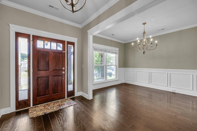 5644 Bungalow Cir, Hixson, TN 37343 - entrance foyer with a chandelier, dark wood finished floors, and ornamental molding