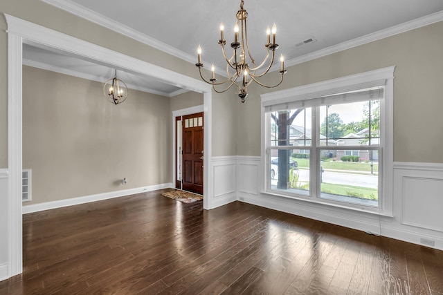 5644 Bungalow Cir, Hixson, TN 37343 - empty room featuring a chandelier, dark wood-style floors, wainscoting, and crown molding