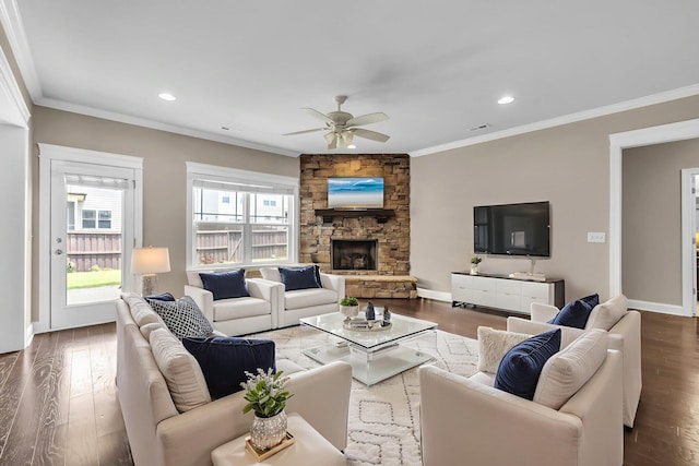 5644 Bungalow Cir, Hixson, TN 37343 - living area with a ceiling fan, ornamental molding, wood finished floors, recessed lighting, and a stone fireplace