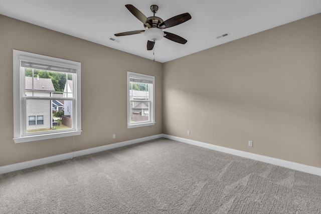 5644 Bungalow Cir, Hixson, TN 37343 - unfurnished room featuring healthy amount of natural light, carpet, and a ceiling fan