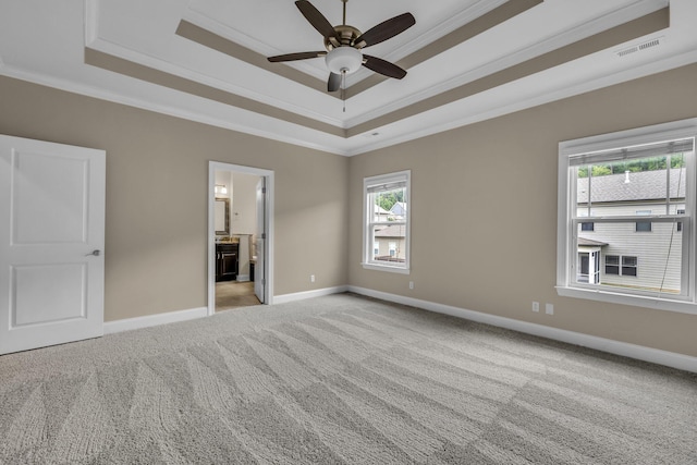 5644 Bungalow Cir, Hixson, TN 37343 - unfurnished bedroom with a raised ceiling, ornamental molding, carpet flooring, and connected bathroom