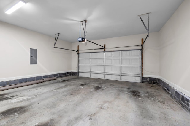 5644 Bungalow Cir, Hixson, TN 37343 - garage featuring electric panel and a garage door opener