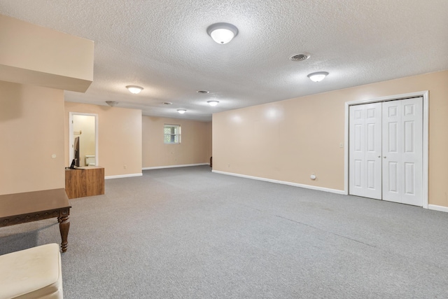 6509 Mill Stream Dr, Harrison, TN 37341 - below grade area featuring carpet flooring and a textured ceiling