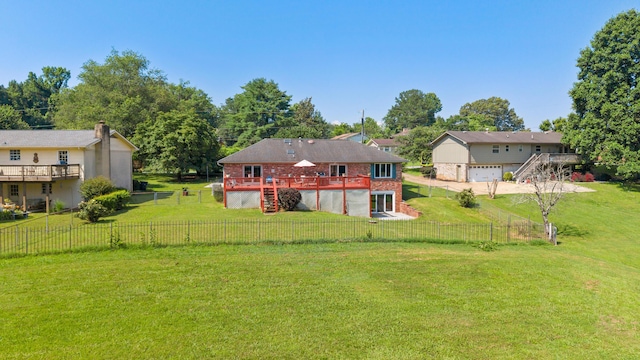 6509 Mill Stream Dr, Harrison, TN 37341 - rear view of property with a wooden deck, stairway, a fenced backyard, brick siding, and a garage
