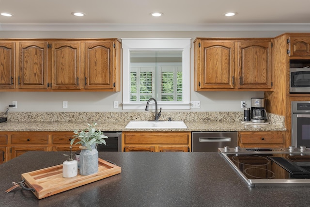 305 River Pointe Cir NE, Charleston, TN 37310 - kitchen featuring appliances with stainless steel finishes, recessed lighting, brown cabinets, and ornamental molding