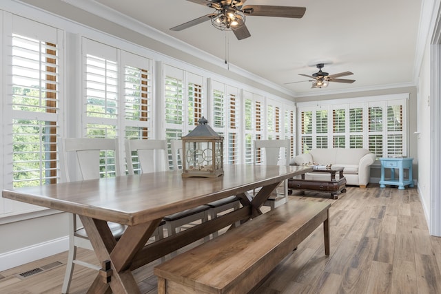 305 River Pointe Cir NE, Charleston, TN 37310 - sunroom / solarium featuring crown molding, healthy amount of natural light, wood finished floors, and french doors