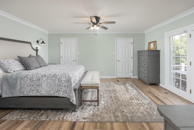 305 River Pointe Cir NE, Charleston, TN 37310 - bedroom with crown molding, access to outside, wood finished floors, and ceiling fan