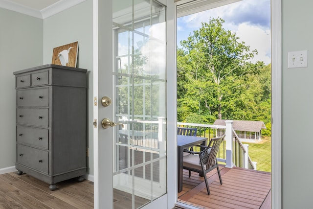 305 River Pointe Cir NE, Charleston, TN 37310 - doorway to outside featuring ornamental molding and wood finished floors