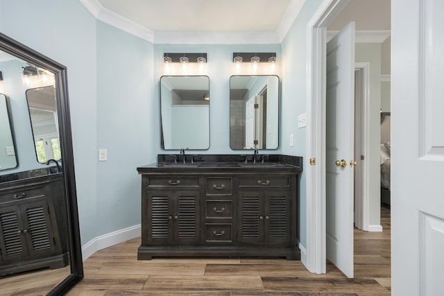305 River Pointe Cir NE, Charleston, TN 37310 - bathroom featuring double vanity, crown molding, wood finished floors, and ensuite bathroom